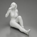 Tired woman mechanic in sexy shirt pants sitting and drinking water during from bottle - Only-Games