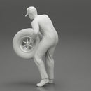 Auto mechanic walking and carrying tyre - Only-Games