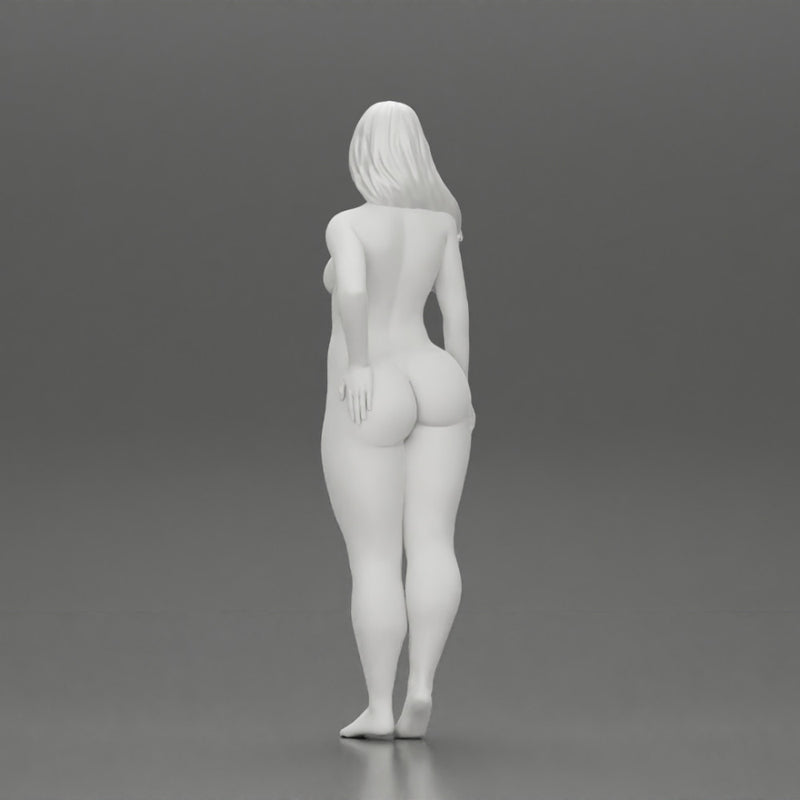 Naked girl standing putting her left hand on her hip