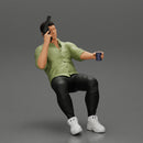 Gangster sitting at the table with a glass of whisky holding gun and playing poker - Only-Games