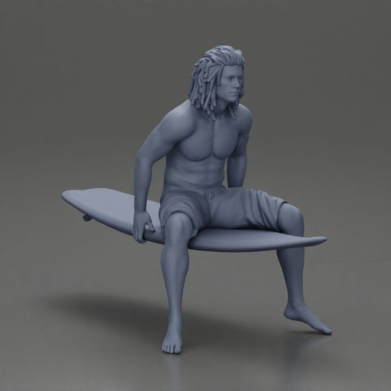 Long-Haired Surfer Sitting on a Surfboard in Calm Ocean Waters, Waiting for the Waves