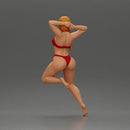 Elegant pose in red bikini, showcasing confidence and playful charm - Only-Games