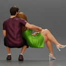 couple sitting on a bench in the park - Only-Games