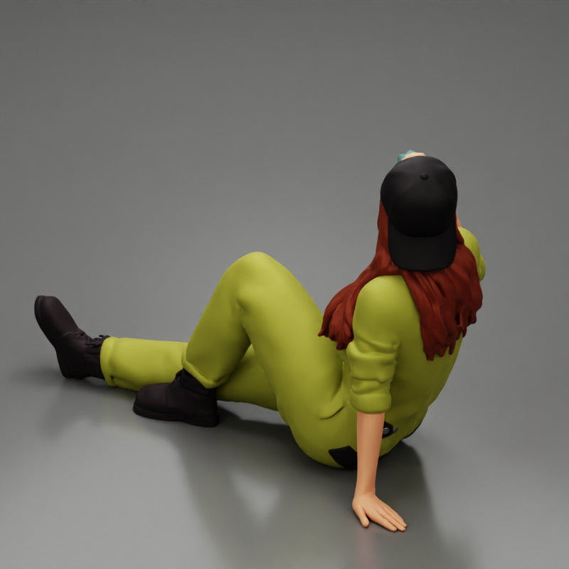 Tired woman mechanic in suit and backwards cap sitting and drinking water during from bottle - Only-Games