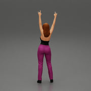 Young girl raised up two hands with sign of the horns - Only-Games
