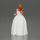 Elegant Bride in White Gown Holding Vibrant Bouquet of Flowers - Only-Games