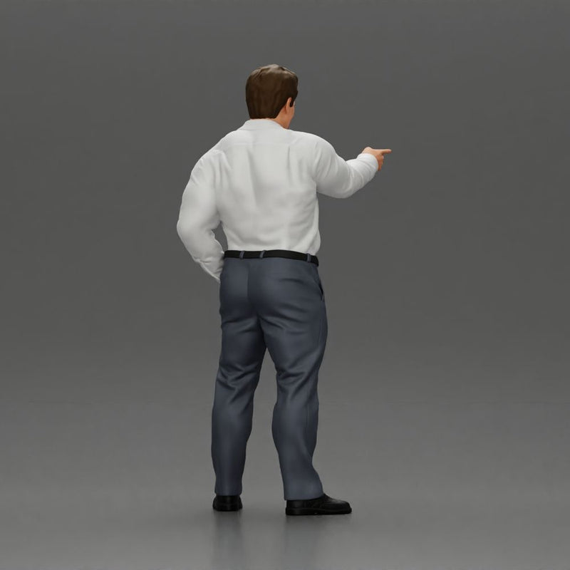 Serious businessman in a white shirt tie, and pants pointing with authority, hand in pocket