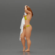 Sexy girl in bikini standing and covering her body by towel - Only-Games