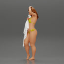 Sexy girl in bikini standing and covering her body by towel - Only-Games