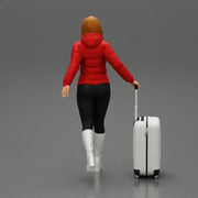 2 Fashion woman in jacket and boots dragging suitcase  walking in airport terminal - Only-Games