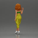 Curly-Haired Woman in Vibrant Green Outfit Striking a Pose - Only-Games