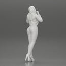 Beautiful girl in jeans and shirt posing - Only-Games