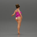 Sexy girl in bikini standing with her friend on the beach - Only-Games