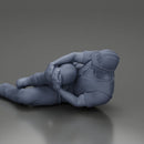 construction worker lying on the floor holding his injured leg - Only-Games