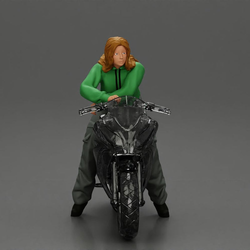 motorcyclist woman hoodie sitting on motorcycle