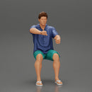 Young man  driving a boat in shorts a shirt and sandals - Only-Games