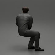 businessman sitting and holding briefcase of money - Only-Games
