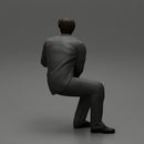 businessman sitting and holding briefcase of money - Only-Games