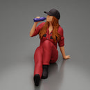 Tired woman mechanic in suit and cap sitting and drinking water during from bottle - Only-Games