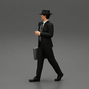 Businessman Walking and Holding His Briefcase - Only-Games