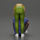 girl standing behind her boyfriend gently touching his face while he sits on the floor in shorts with his hands on his knees - Only-Games