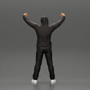 man in a hoodie supporting and holding a scarf - Only-Games