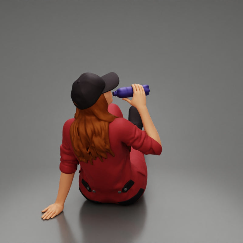Tired woman mechanic in suit and cap sitting and drinking water during from bottle - Only-Games