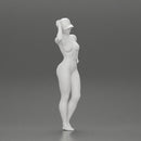 Naked Asian girl in cap standing and thinking - Only-Games