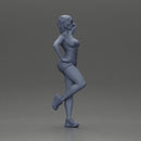 Sexy girl with short hair in shorts leaning on a car - Only-Games