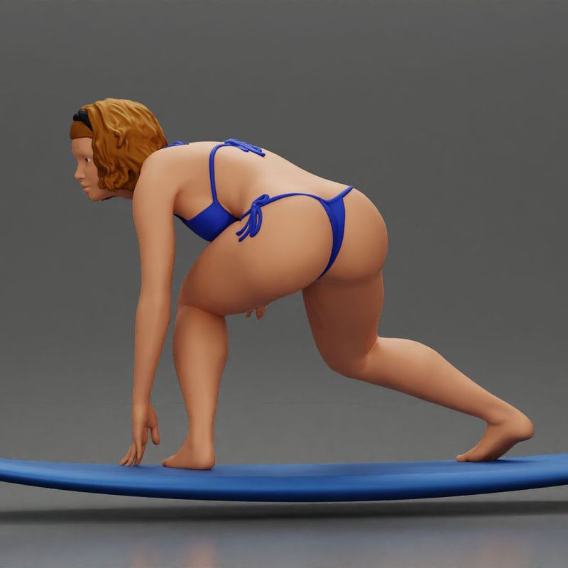 Confident surfer woman in a bikini, riding a wave on her surfboard