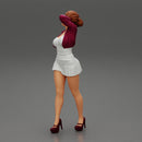 Beautiful woman in a dress walking with hand on head - Only-Games