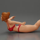 surfer girl with effortless grace, lying on her surfboard as she rides the wave - Only-Games