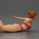 surfer girl with effortless grace, lying on her surfboard as she rides the wave - Only-Games