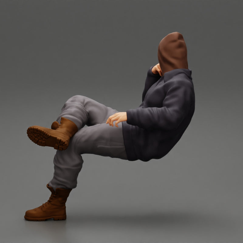 man in leather jacket and jeans sitting cross legged and thinking - Only-Games