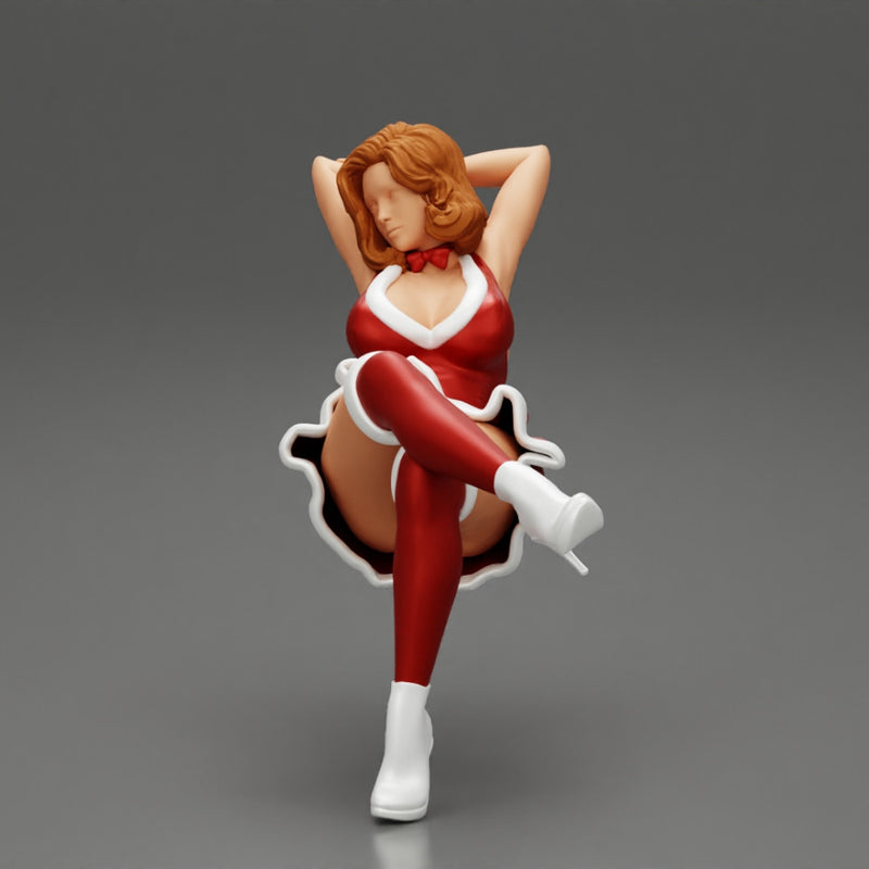 Santa Female sitting in vintage chair