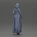 fashionable girl standing and posing in a robe and heels - Only-Games