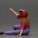 Biker Girl in a helmet who fell off a motorbike, being helped by a man - Only-Games