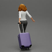 2 Business woman in shirt and trousers pulling suitcase walking in airport terminal - Only-Games