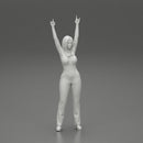 Young girl raised up two hands with sign of the horns - Only-Games