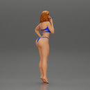 sexy girl in bikini standing smoking cigarette on the beach - Only-Games