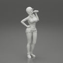 Sexy girl mechanic drinks water during a break - Only-Games