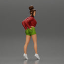 Sexy girl in shorts and an open mini shirt putting her hands in her back pocket - Only-Games