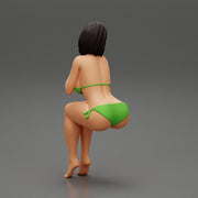 Sexy girl in bikini sitting - Only-Games