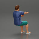 Young man  driving a boat in shorts a shirt and sandals - Only-Games