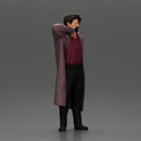 old man with pointed beard leaning against a wall in deep thought with his coat open - Only-Games