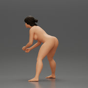 Naked tennis player holding her racket in a ready position - Only-Games