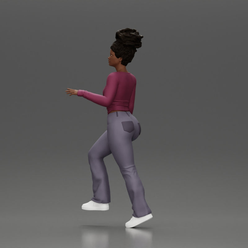 black girl with afro hair walking up stairs