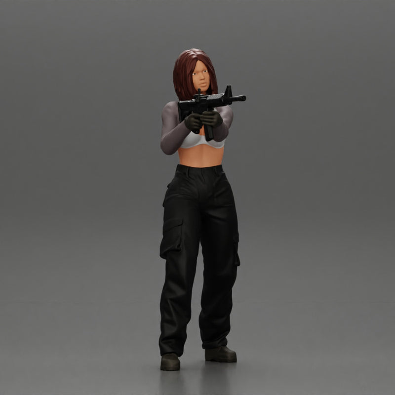 Armed girl going to shoot a gun in a bra with short hair