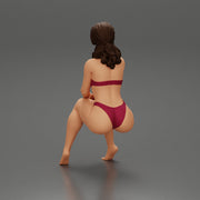 Sexy Girl in bikini Sitting On The Chair with hands on knees - Only-Games