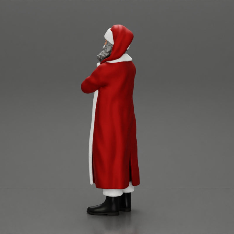 Santa Claus stands with his arms crossed